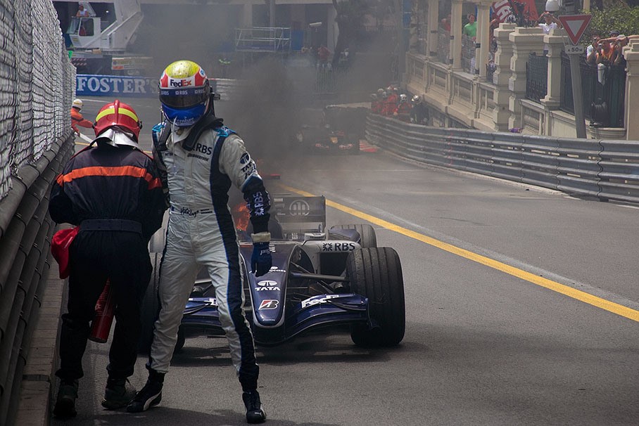 Webber escaping his burning car at Monaco in July 2006. 