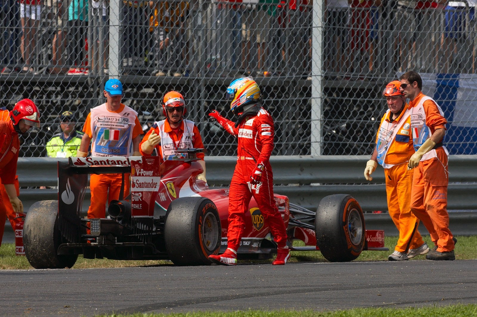 Fernando Alonso has to stop his Ferrari with a problem in the Energy Recovery Systems (ERS), Italian Grand Prix, Monza, 2014. 