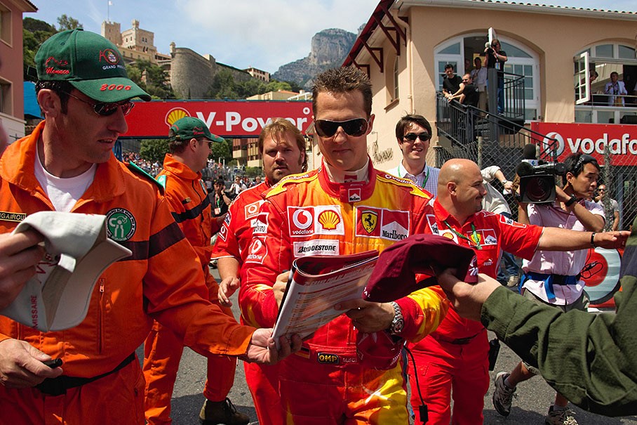 No, not a marshal with a defect washing machine, it is Michael Schumacher on his way to paddock at Monaco in July 2006. 