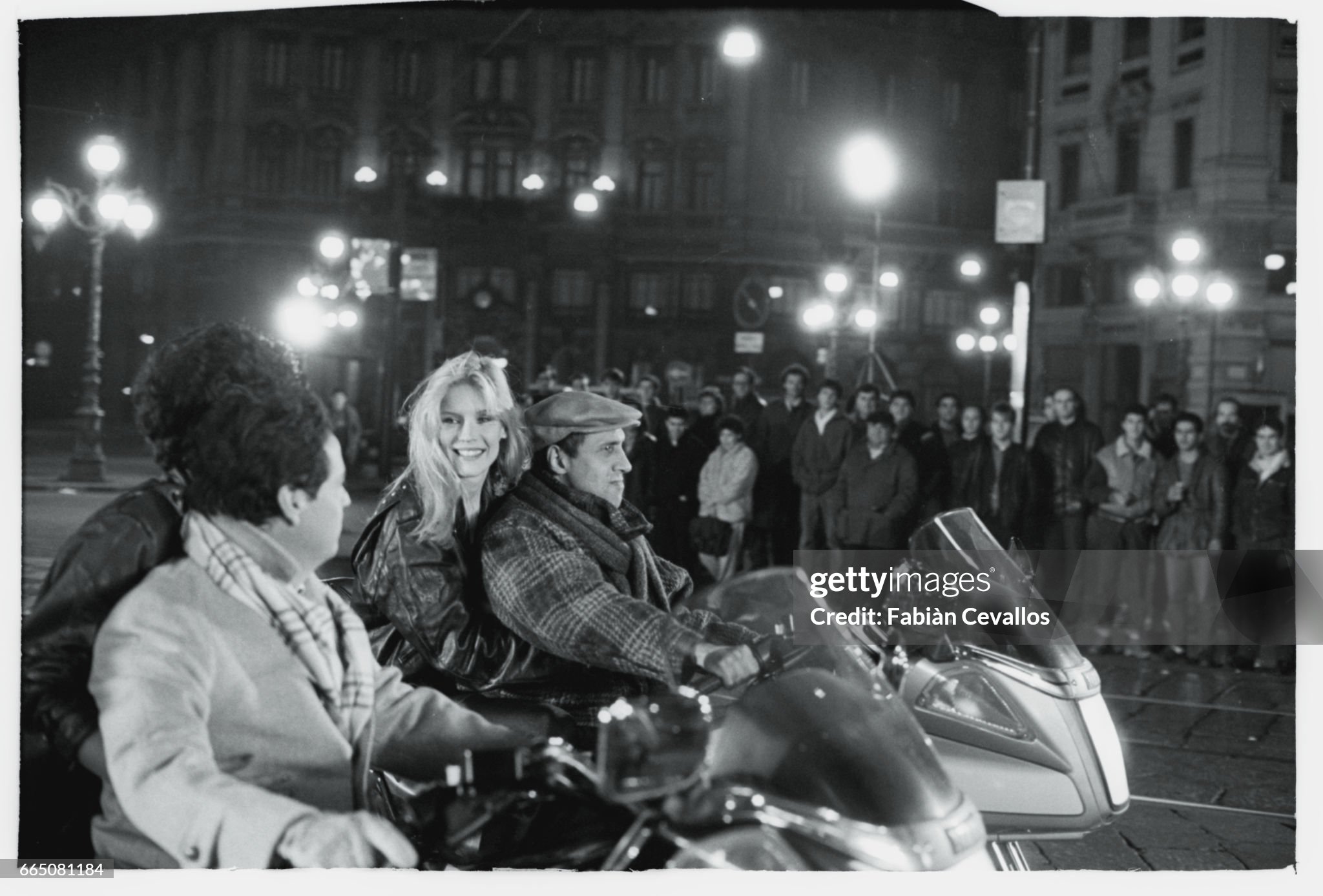 In a scene from the movie ‘Lui e peggio di me’, directed by Enrico Oldoini, actor and singer Adriano Celentano (wearing a cap) and Renato Pozzetto (wearing a scarf) both ride motorcycles with a woman behind them on 01 December 1984. 