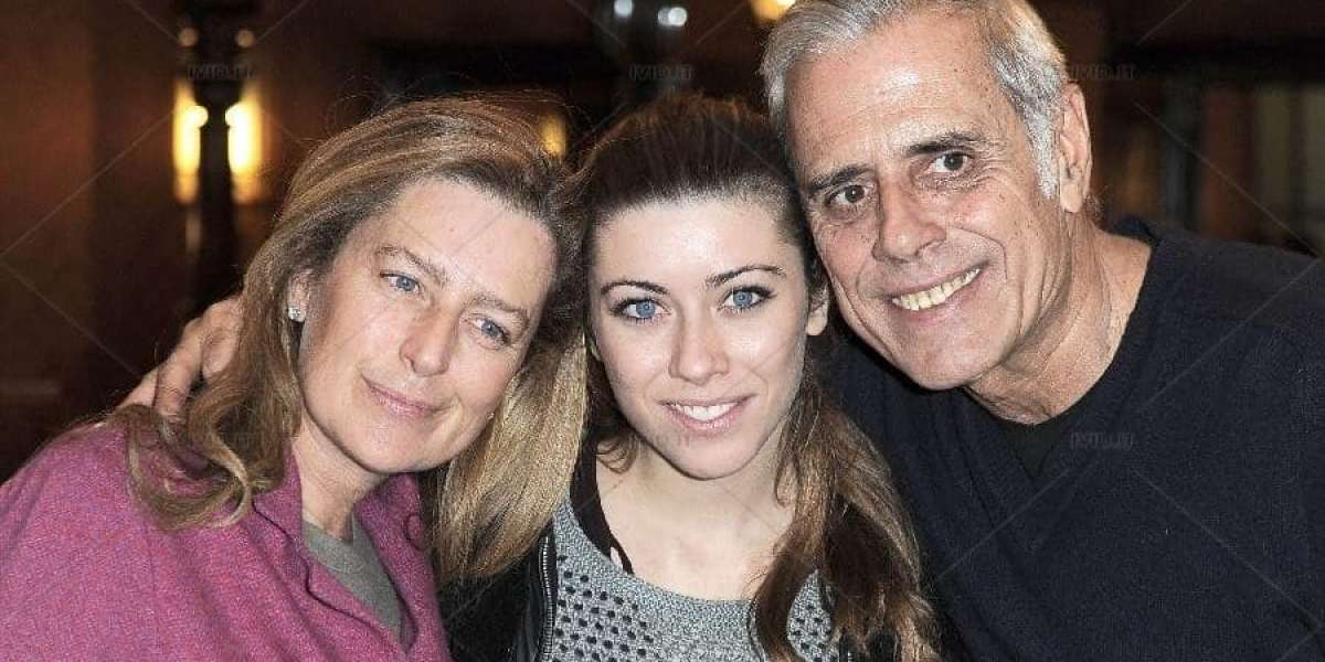 Teo Teocoli with wife and daughter.