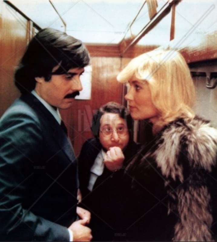 Teo Teocoli, Alvaro Vitali and Janet Agren in the 1981 film ‘L’onorevole con l’amante sotto il letto’.