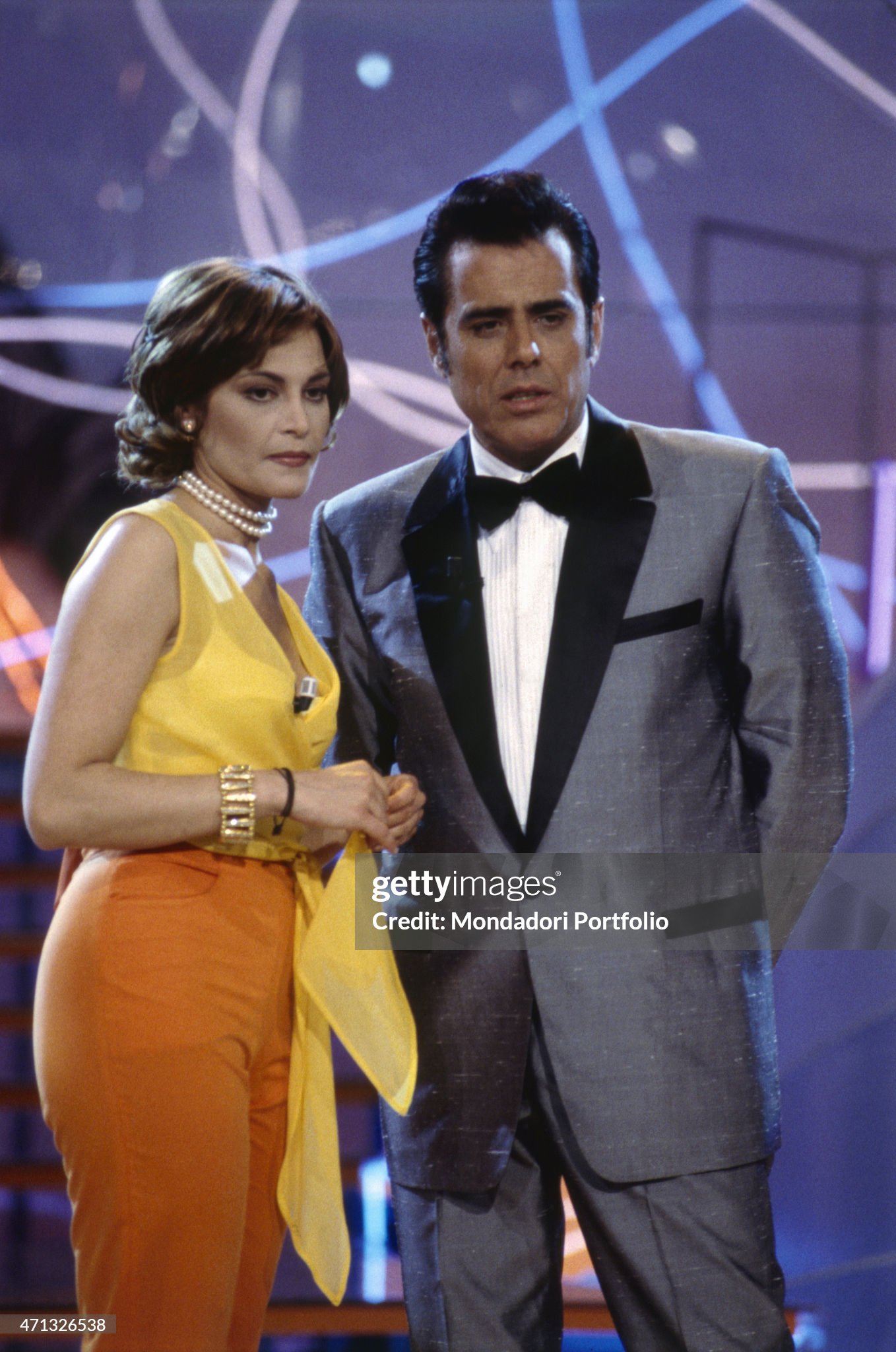Teo Teocoli and Italian TV presenter, showgirl and actress Simona Ventura presenting the TV variery show Il boom in Italy in 1996. 