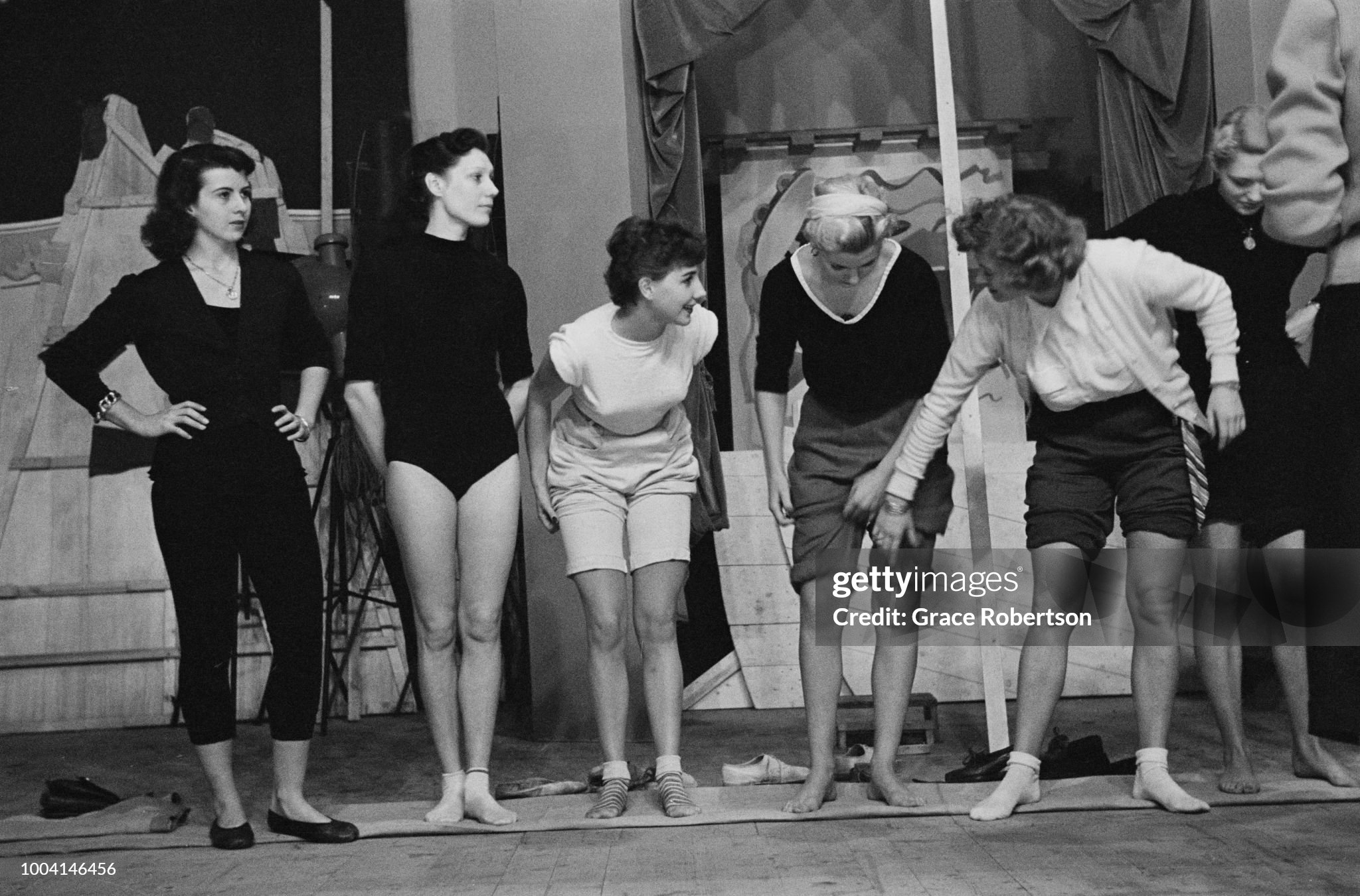 Members of a newly-formed Bluebell Girls dance troupe from England are joined by a French dancer (far left) for rehearsals of a puppet dance at the Nuevo Teatro in Milan in November 1951. 