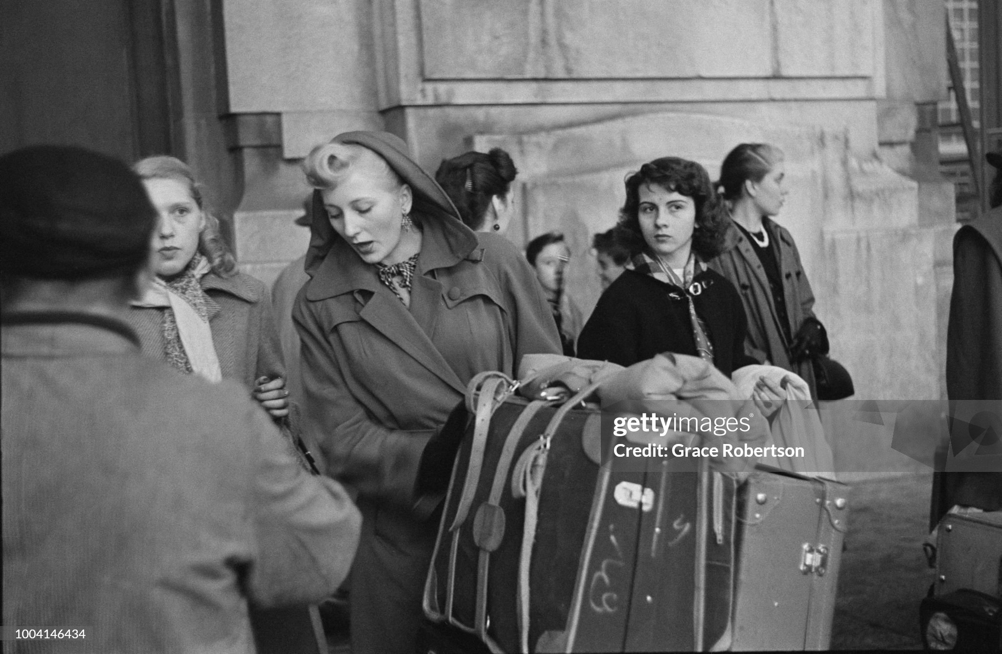Members of a newly-formed Bluebell Girls dance troupe from England, arrive at a railway station in Milan, where they have their first engagement, November 1951. 