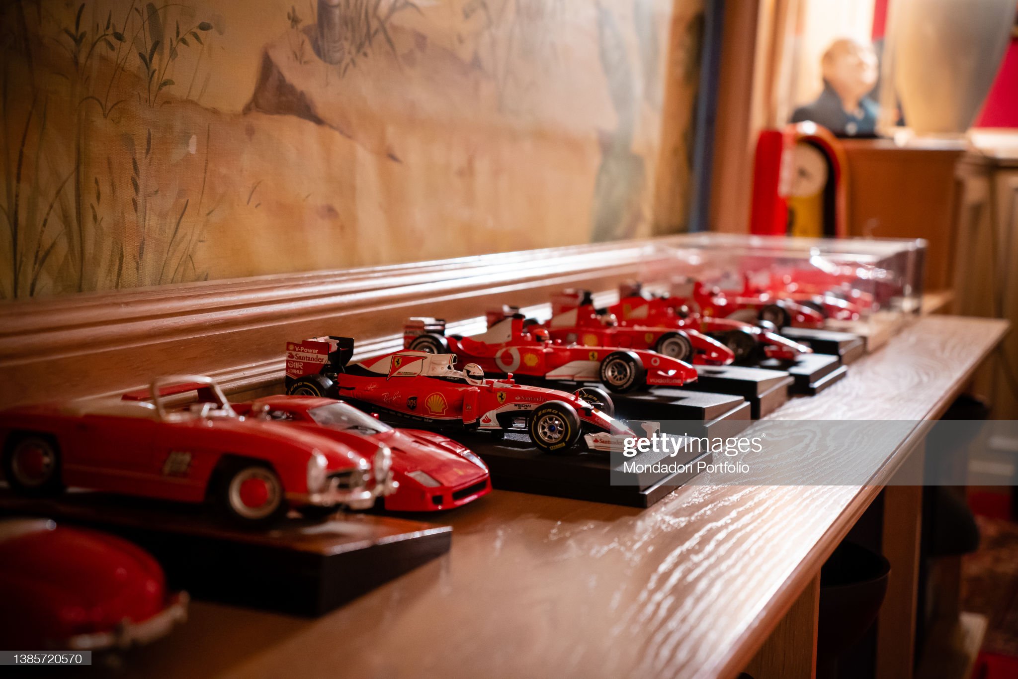 Collection of Ferrari models of the actor and comedian Massimo Boldi, positioned on a shelf under the cinema hall in his historic home at Basiglio, Milan, on 16 November 2021. 