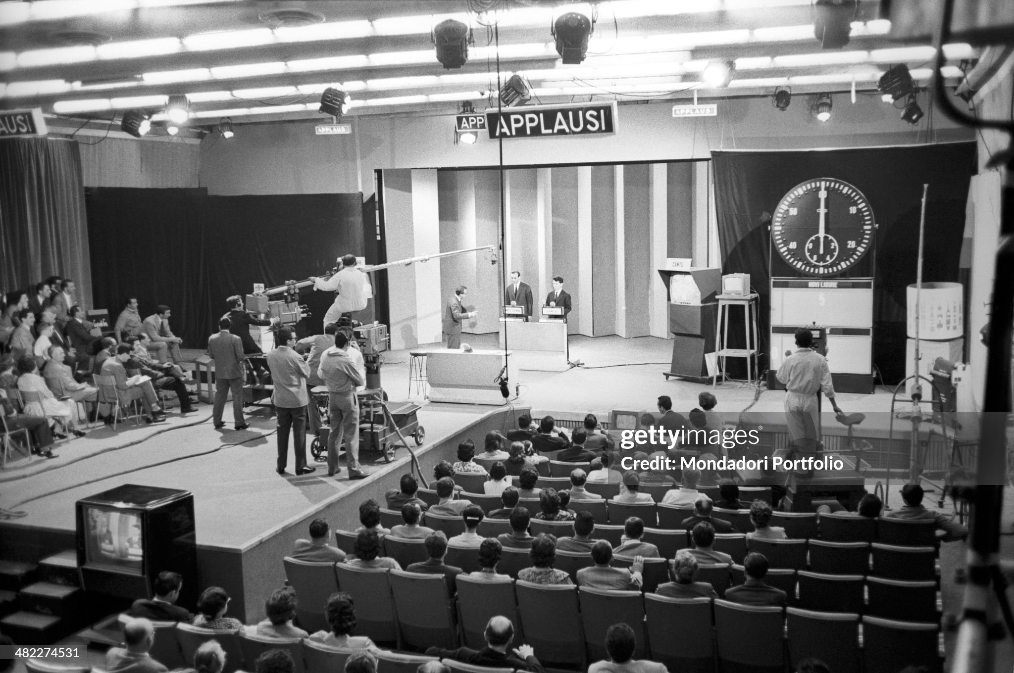 The public attending the TV quiz Campanile sera presented by Italian presenter Mike Bongiorno in Milan on 16 November 1961. 