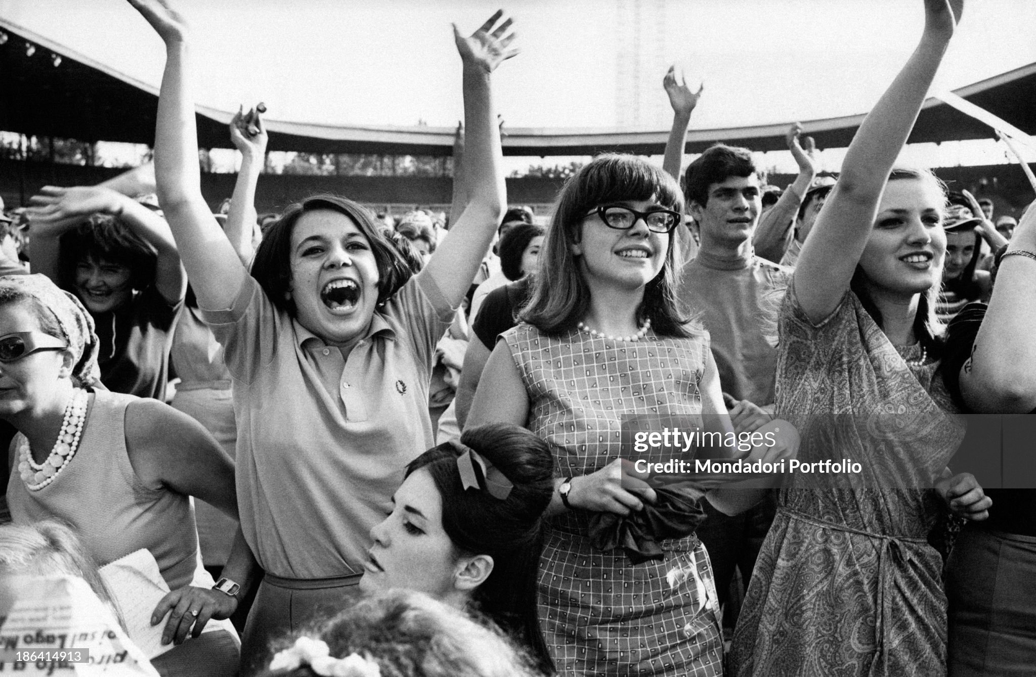 Some girls at the Velodrome Vigorelli at the concert of the British band The Beatles, in their first leg of the summer tour in Italy in Milan on 24 June 1965. 