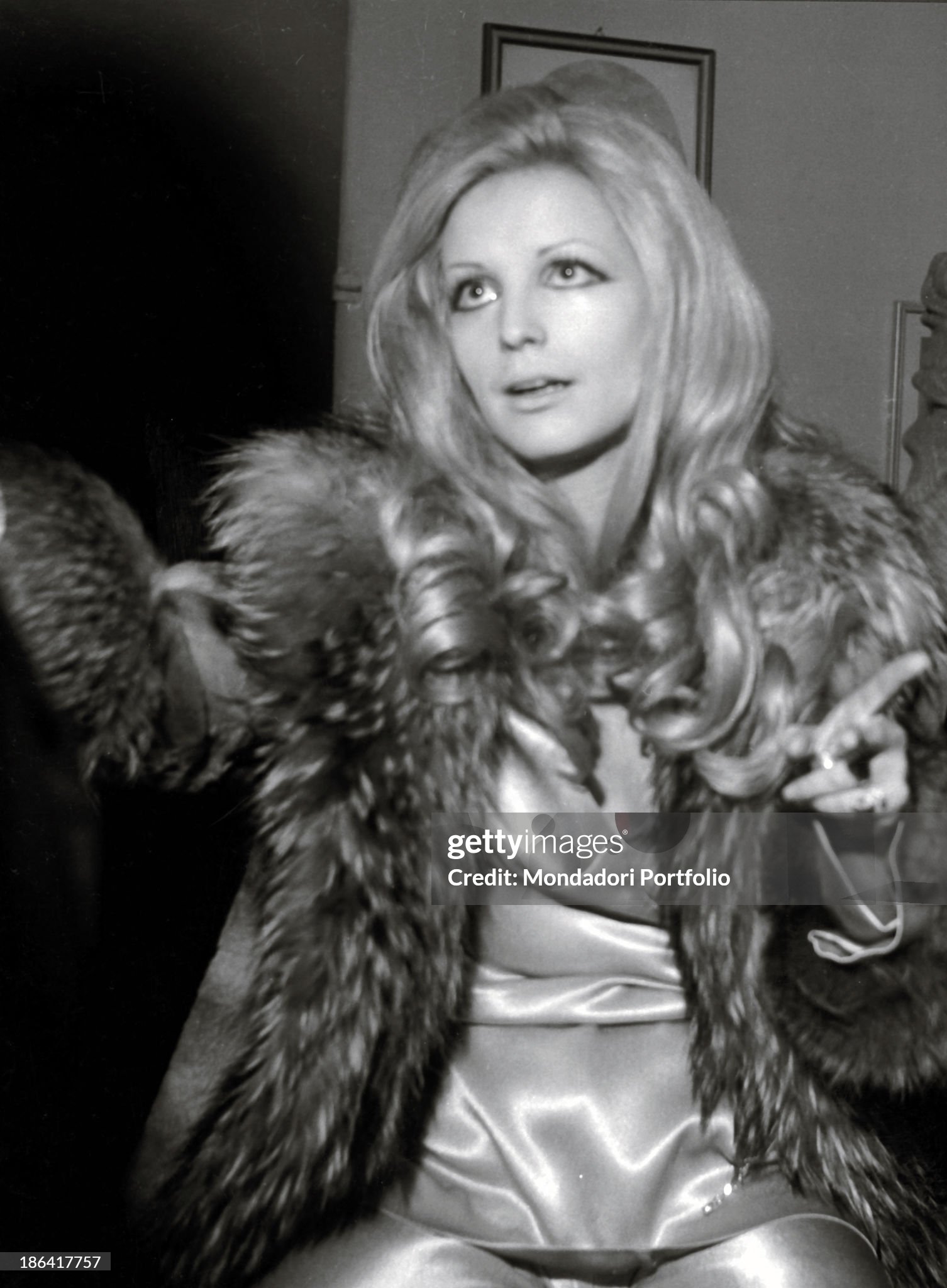Italian singer Patty Pravo (Nicoletta Strambelli) wearing a fur coat in 1970s. 
