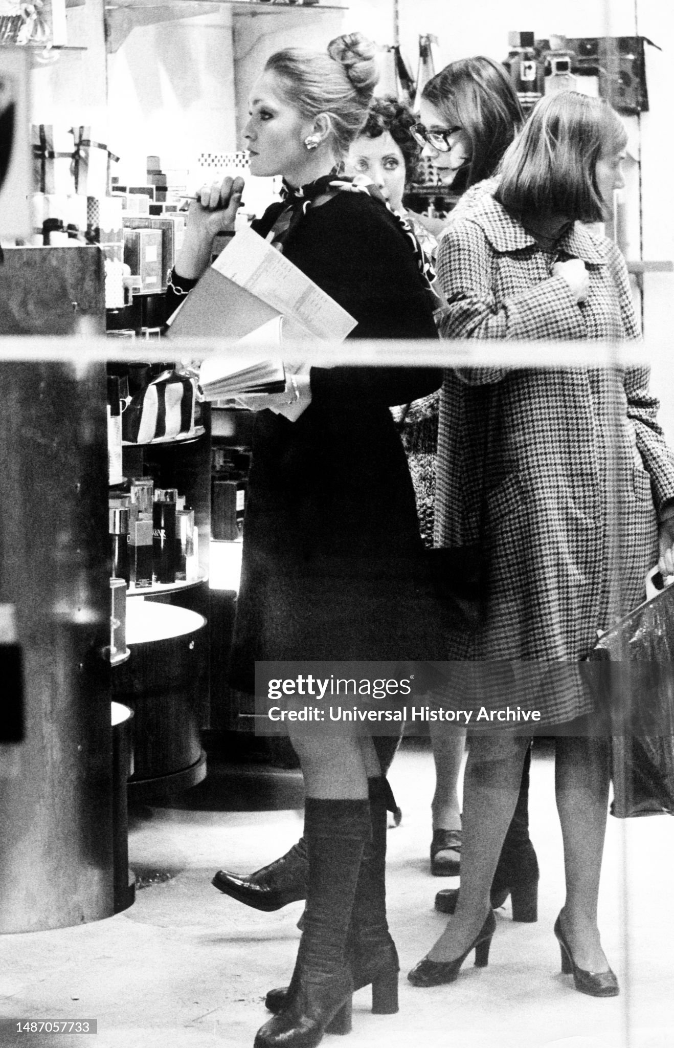 Salesgirl in a department store in Milan in 1973. 