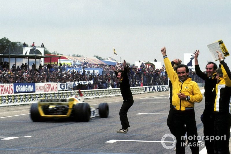 The Renault team including Jean Sage, Renault Team Chief, celebrate Jean Pierre Jabouille's first win and their first Grand Prix victory. 