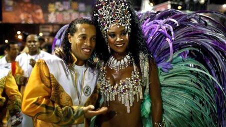 Ronaldinho at the Carnival of Rio de Janeiro alongside Cris Vianna, queen of drums.
