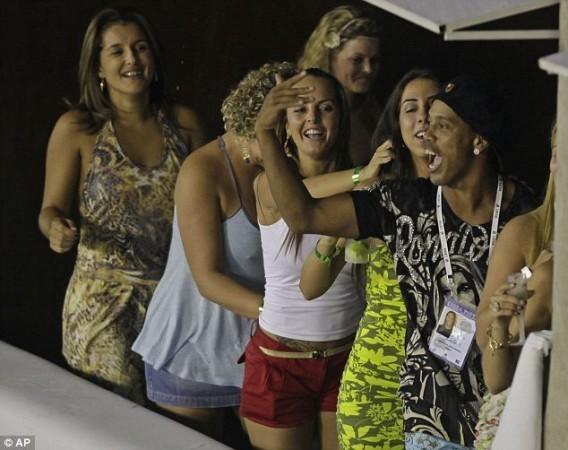 Ronaldinho with some women.
