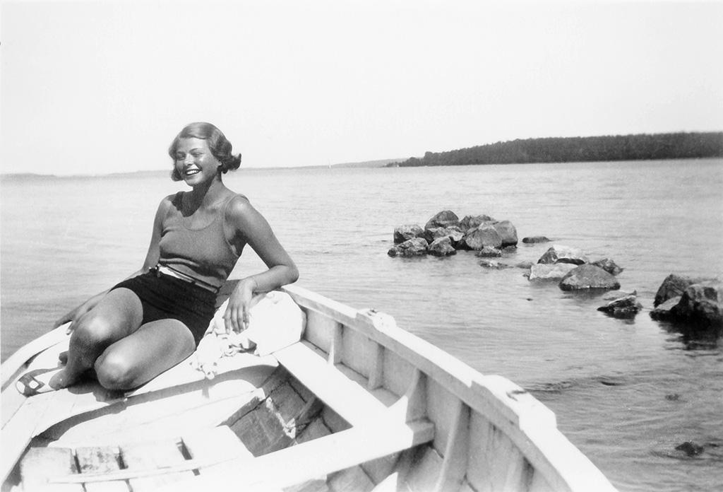Ingrid Bergman sunbathing in a boat on Lake Mälaren in 1932.