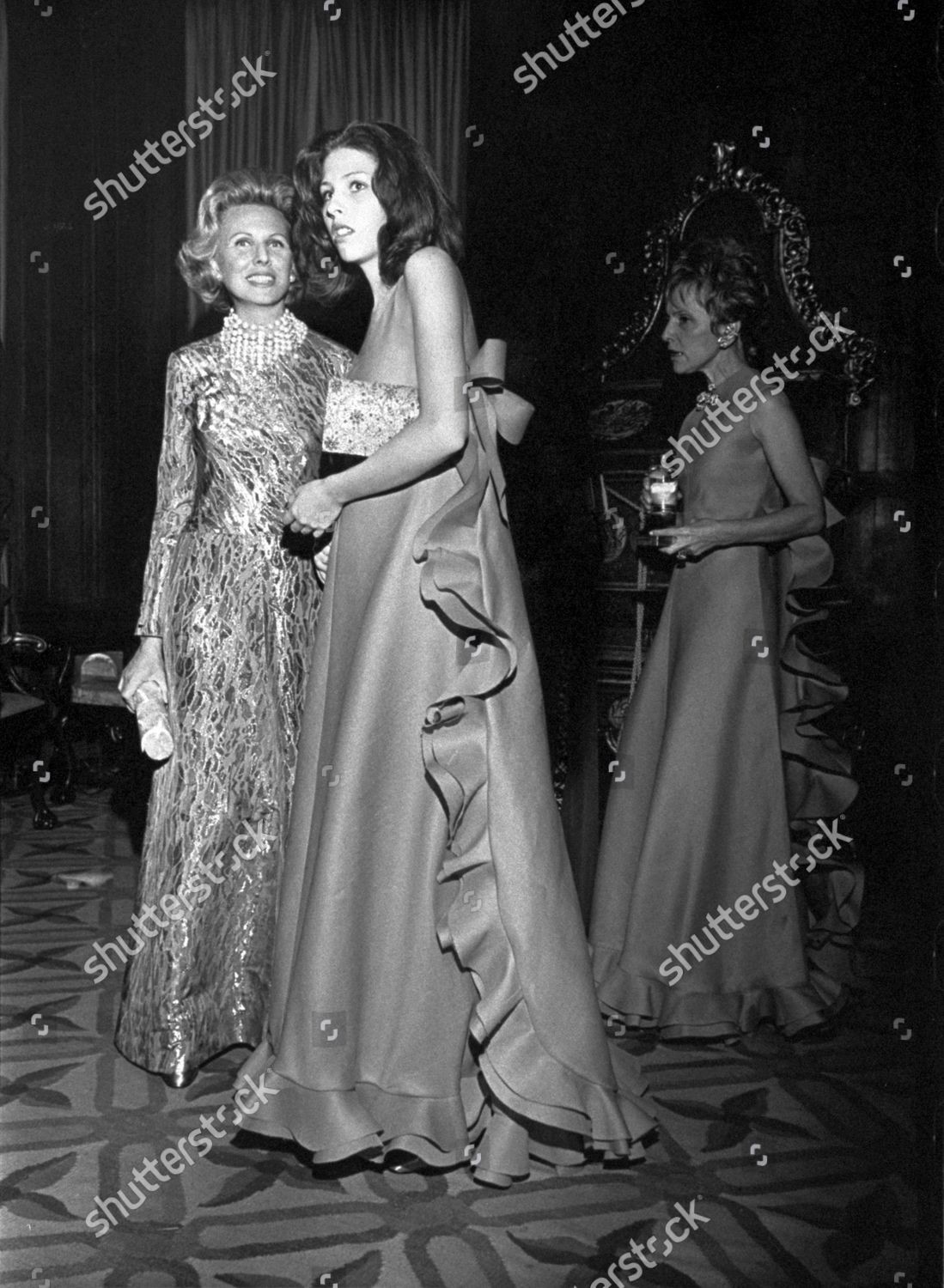 Andrea de Portago and her mother, in dresses by Christian Dior, at a party for Carmencita Marinez-Bordiú in New York. Vogue January 15, 1972. 