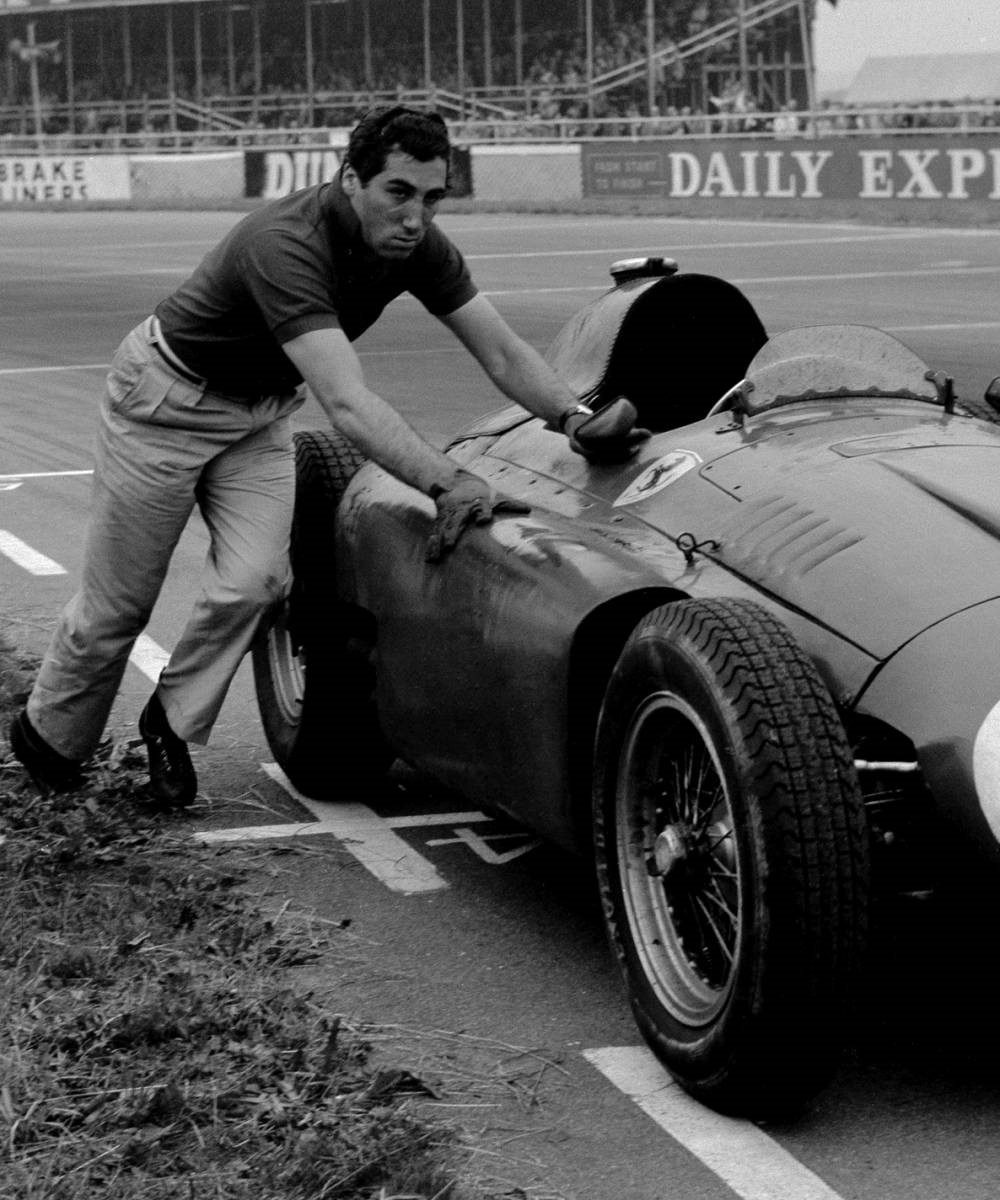 De Portago getting his Ferrari / Lancia over the line at Silverstone in ’56.