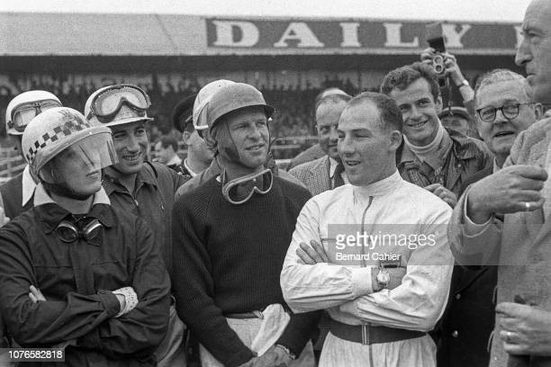 Cesare Perdisa, Alfonso de Portago, Peter Collins, Stirling Moss, Grand Prix of Great Britain, Silverstone Circuit, 14 July 1956. Drivers breefing before the start of the 1956 British Grand Prix. 
