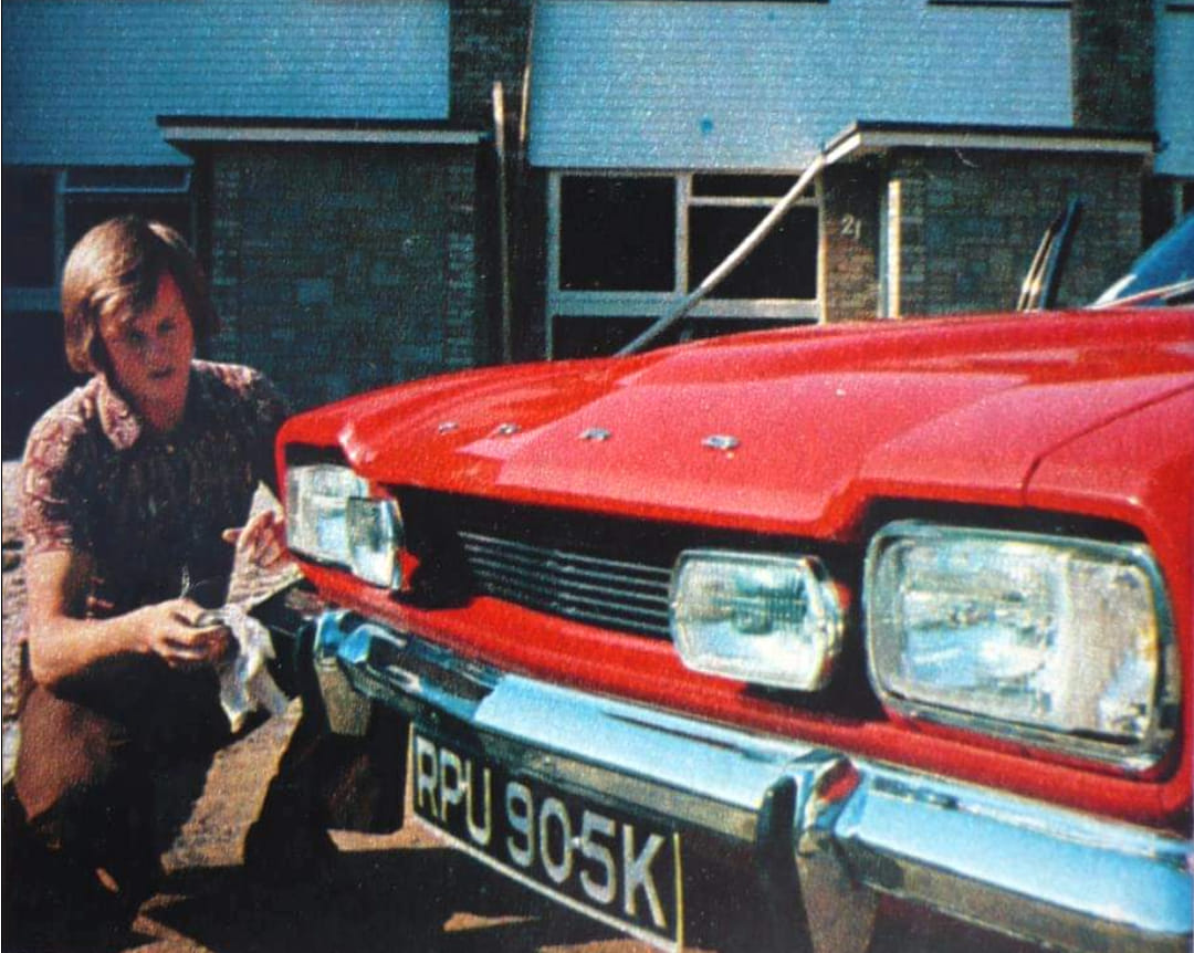 Ronnie Peterson with his red Ford Escort.