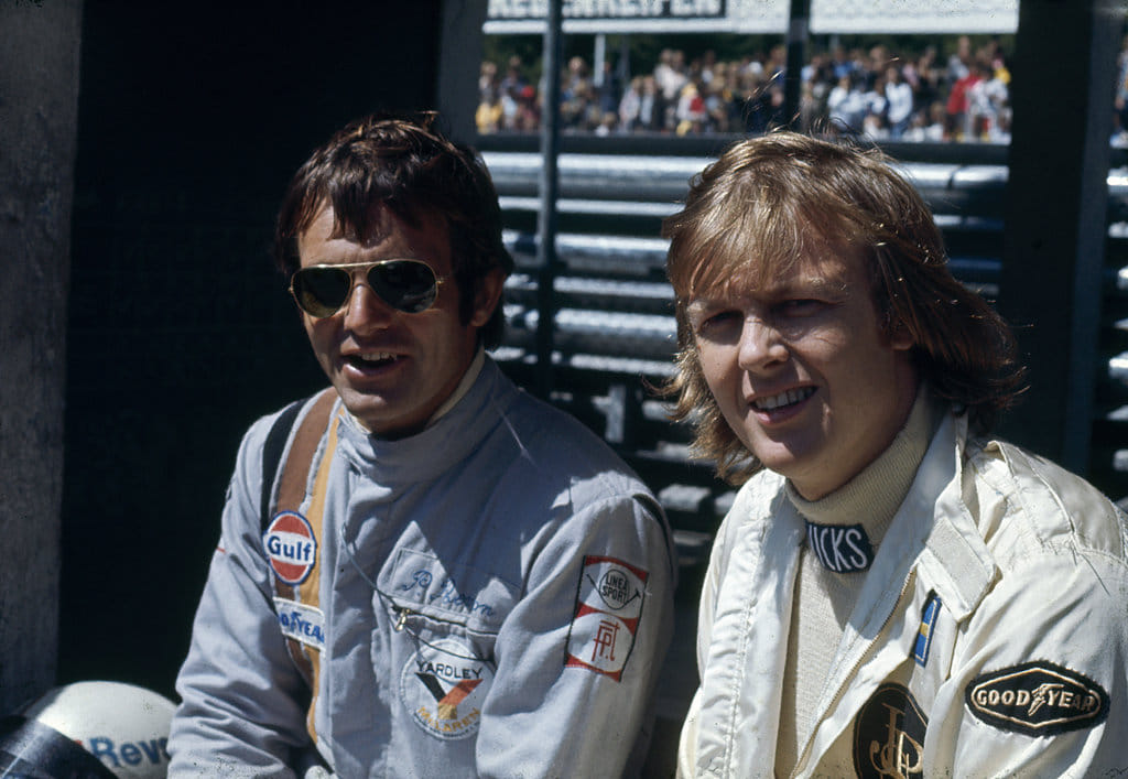 Peter Revson, McLaren, with Ronnie Peterson, Lotus 72, in 1973.