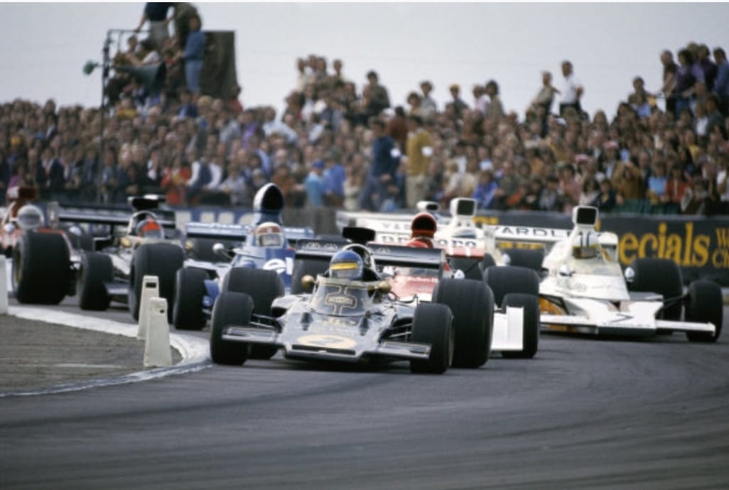Ronnie Peterson leads Niki Lauda after the second start of the 1973 British Grand Prix.  
