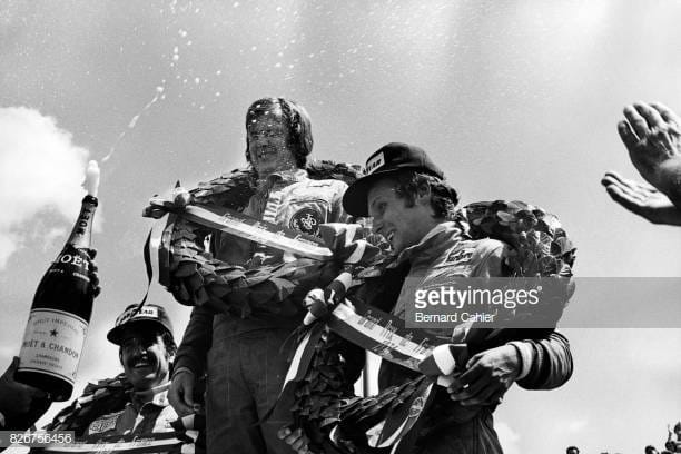 Ronnie Peterson on the podium with Niki Lauda and Clay Regazzoni at the French Grand Prix in Dijon-Prenois on 07 July 1974. 