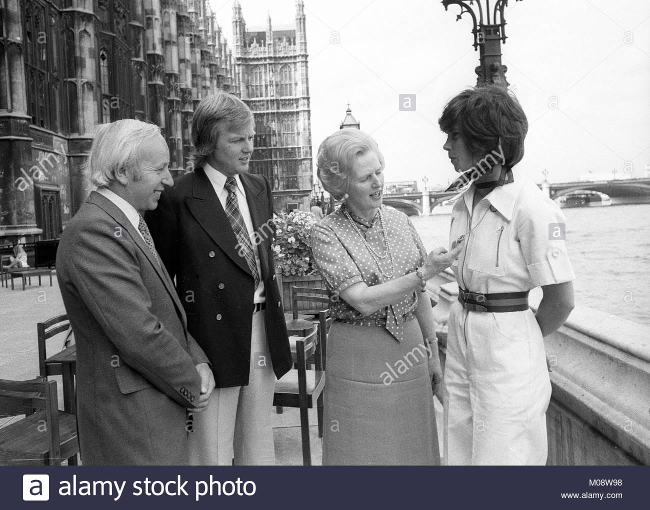 John Surtees, Ronnie Peterson, Margareth Thatcher and Divina Galica on the House of Commons Terrace, London, in July 1976. 
