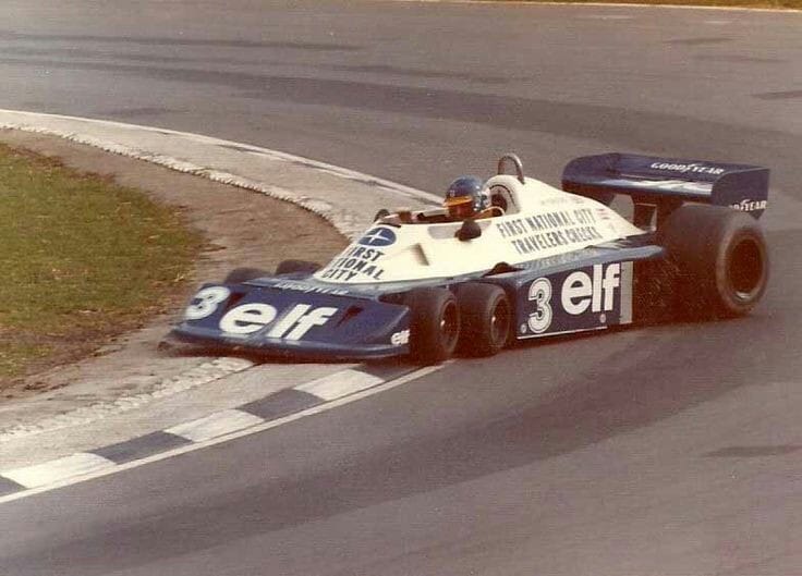 Ronnie Peterson sliding the six-wheeled Tyrrell P34.