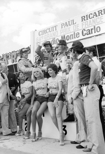 Mario Andretti and Ronnie Peterson, Lotus teammates, celebrate a 1-2 success at the French Grand Prix in Paul Ricard on 02 July 1978.