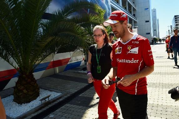 Iina with Sebastian Vettel.