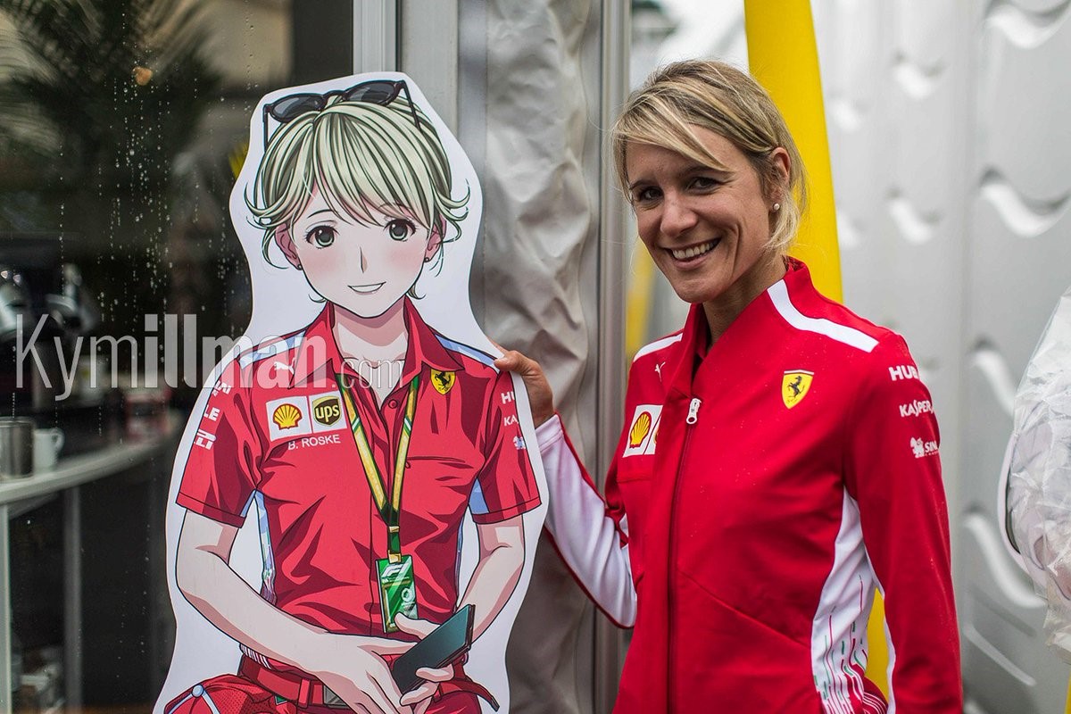 Britta Roeske with her Manga Standee at Japanese GP. 