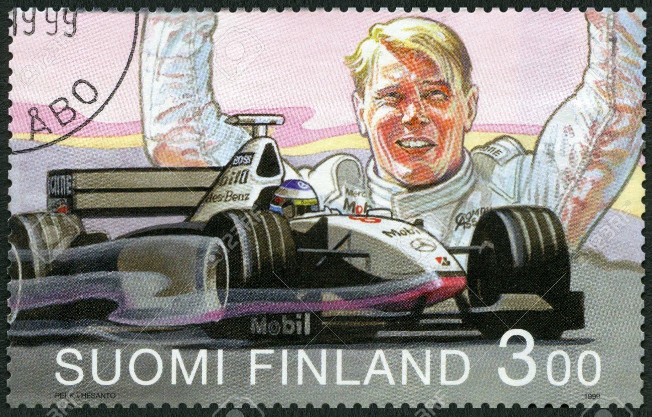 A stamp printed in Finland shows Mika Hakkinen, Formula 1 driving champion 1998.