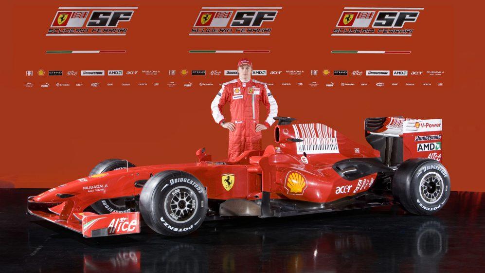 Kimi Raikkonen behind his Ferrari F1.