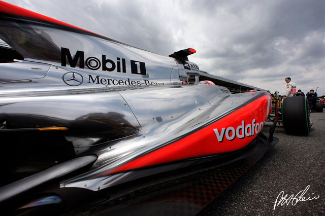 Jenson Button in his McLaren sponsored by Vodafone.
