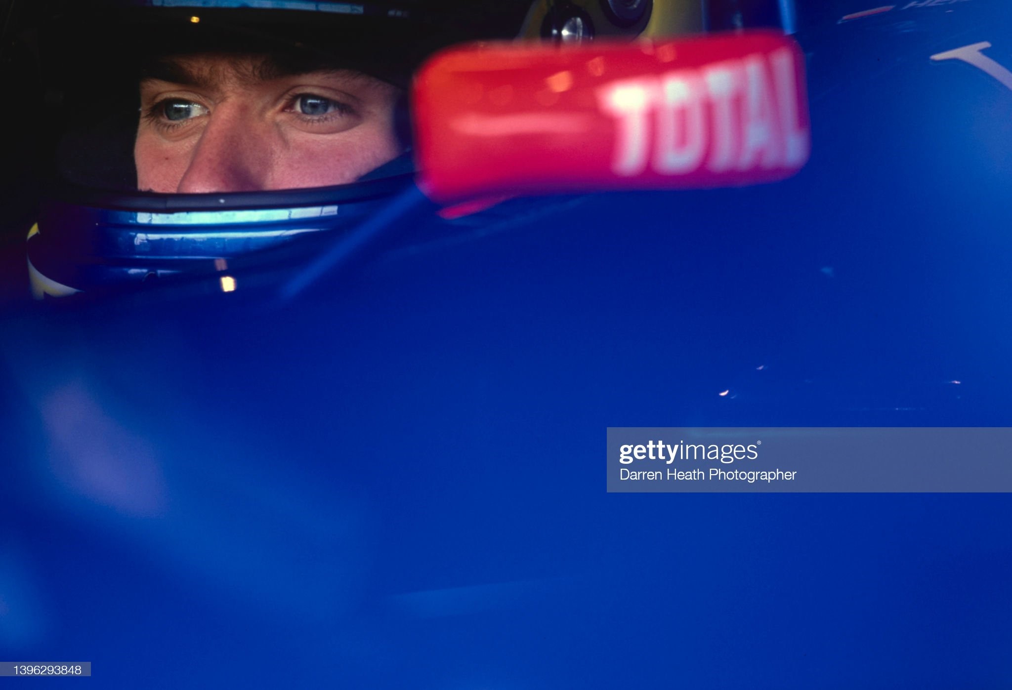 Nick Heidfeld from Germany looks out from the cockpit of the n.15 Gauloises Prost AP03 Peugeot V10 during practice for the Formula One Spanish Grand Prix on 6th May 2000 at the Circuit de Barcelona-Catalunya. 
