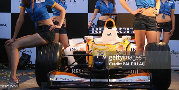 Promotion girls and a Renault F1 in 2008. 