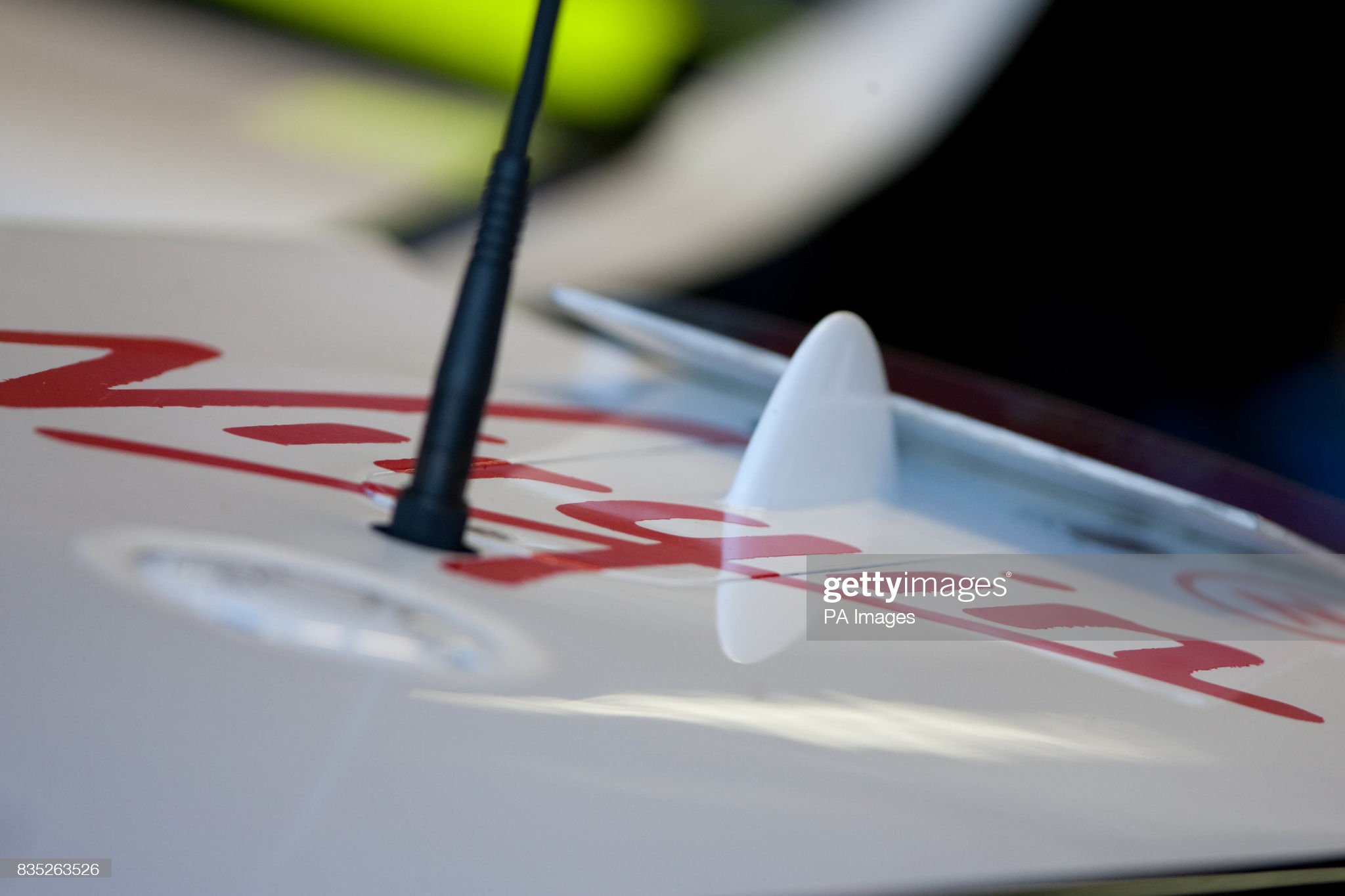 The new Virgin sponsorship logo is applied to a Brawn GP car before the qualifying session at Albert Park in Melbourne, Australia, on 23 March 2009. 