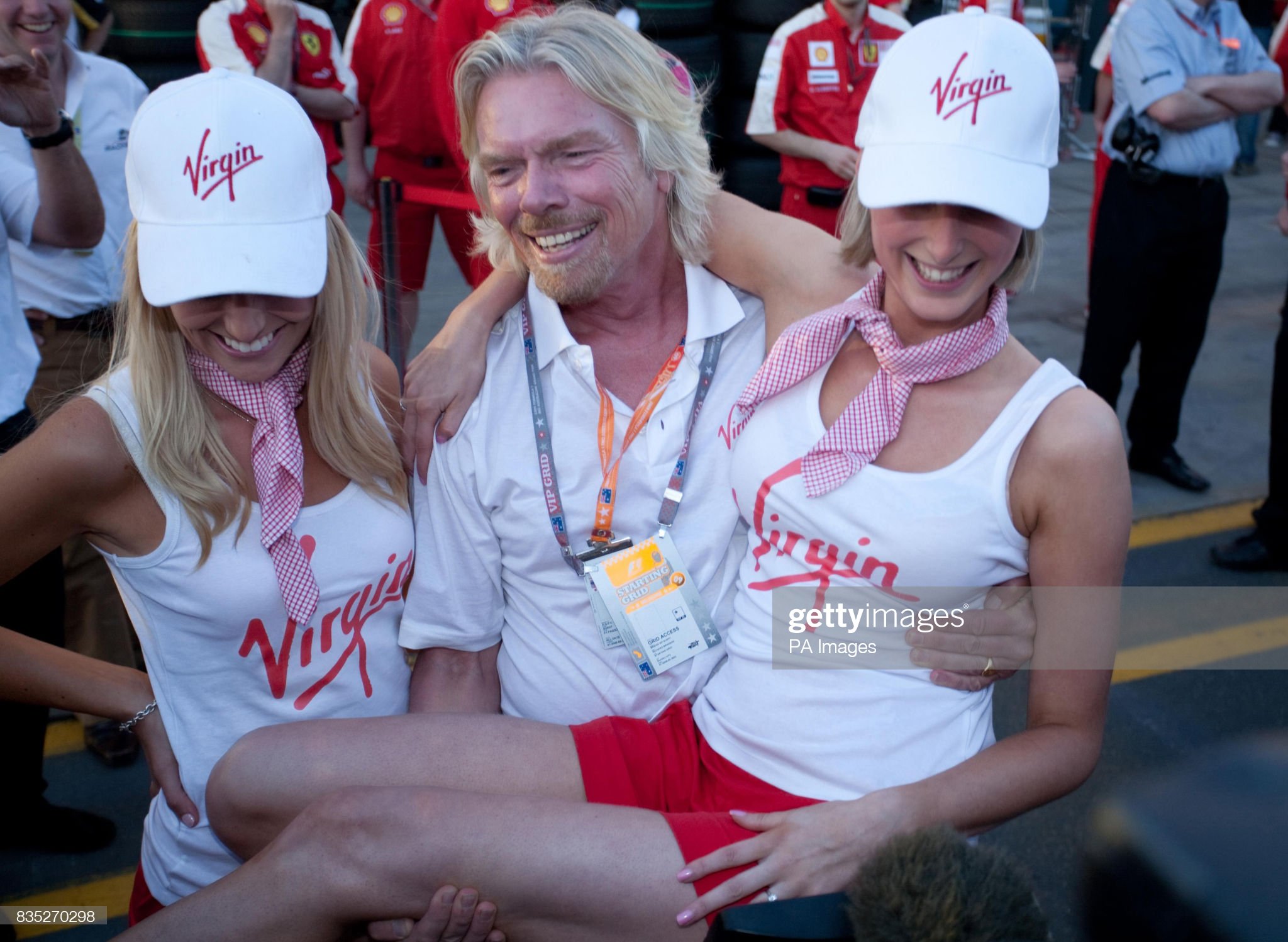 Brawn GP's main sponsor Virgin's Sir Richard Branson celebrates Brawn's first and second places during the Australian Grand Prix at Albert Park in Melbourne, Australia, on 29 March 2009. 