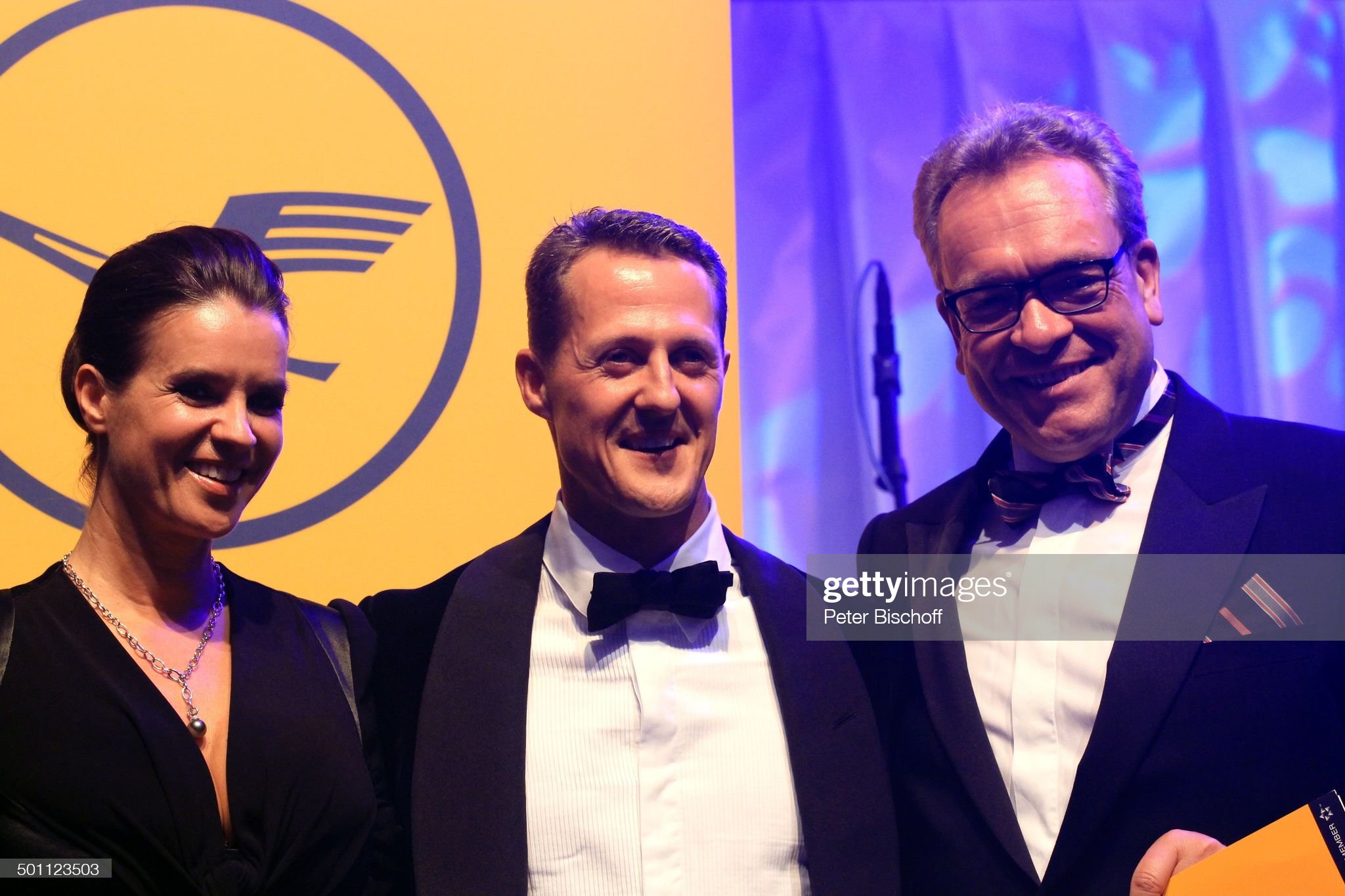 Michael Schumacher with the two-time Olympic champion Katarina (Kati) Witt and Stefan Lauer, a Lufthansa top manager, on 10 November 2012. 