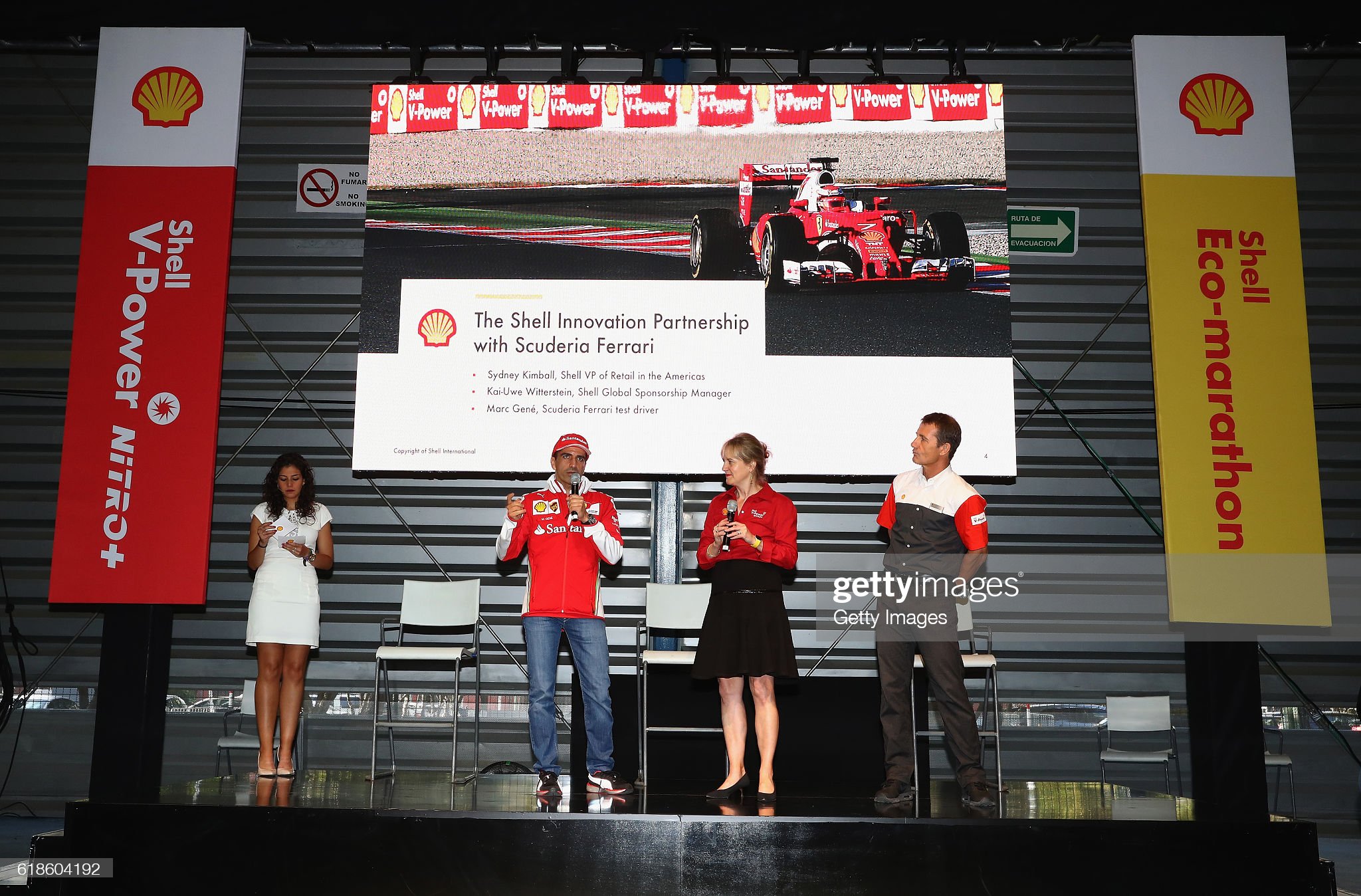 Marc Gene of Spain and Ferrari talks with host Giselle Zarur Maccise, Sydney Kimball, Shell Retail Americas and Kai-Uwe Witterstein, Shell Sponsorship on stage at the Shell Eco Marathon event during the Formula One Grand Prix of Mexico at Autodromo Hermanos Rodriguez on 27 October 2016 in Mexico City. 