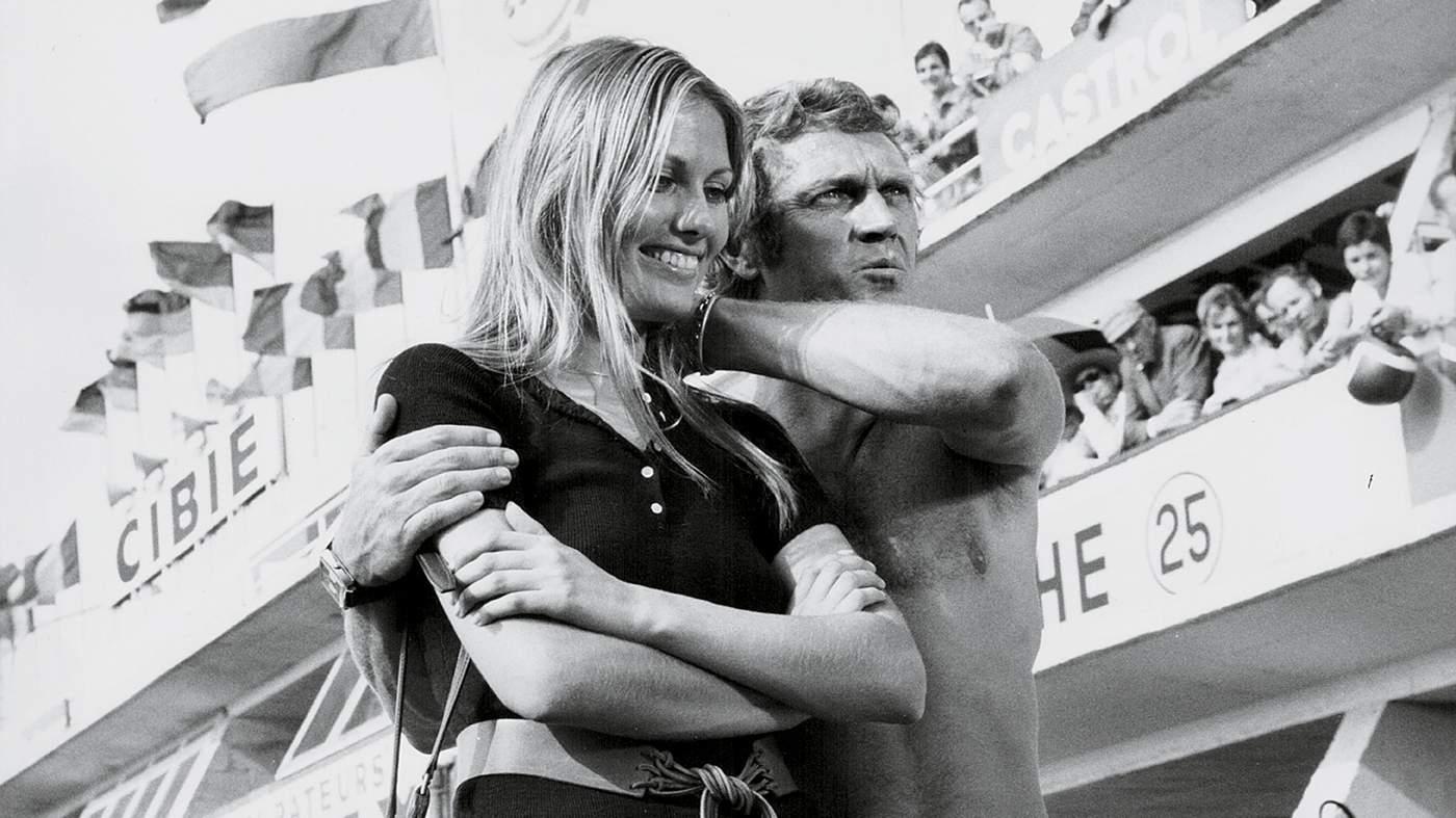 Steve McQueen with a blonde woman.