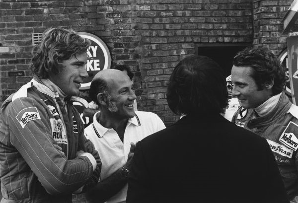 1976, South African Grand Prix. James Hunt, Stirling Moss and Niki Lauda.