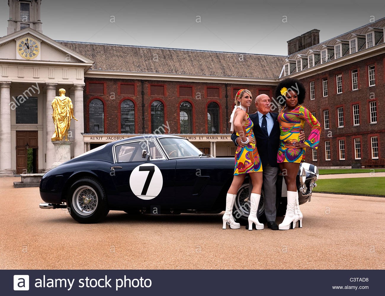 Sir Stirling Moss with swinging-sixties models and 1961 Ferrari.