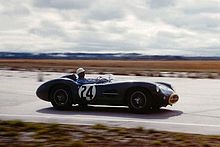 Moss racing an Aston Martin DBR1 at the 1958 12 Hours of Sebring.