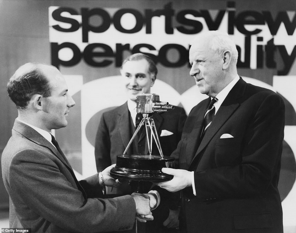 The London-born superstar picks up his “Sports Personality of the Year” award for his Formula One exploits in 1961.