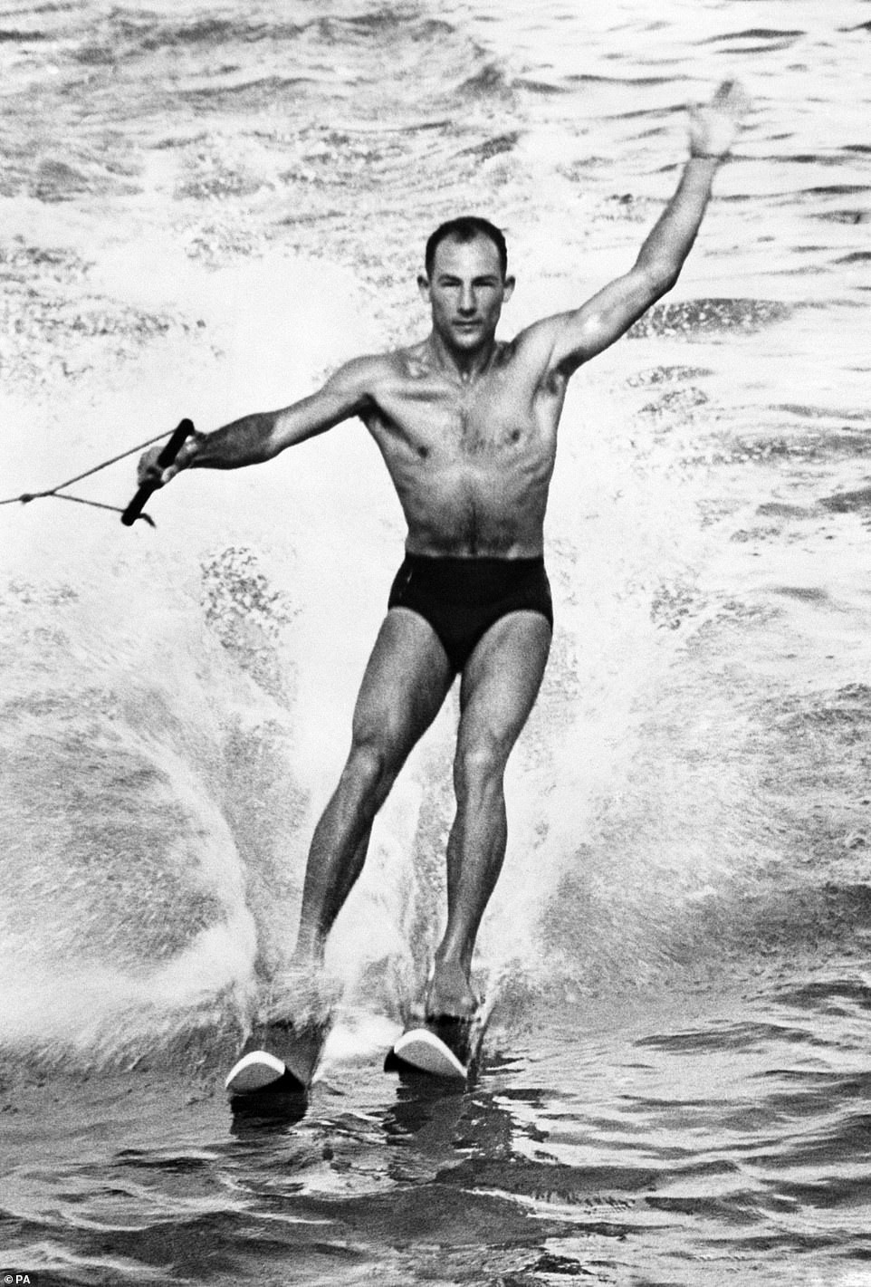 The Brit trades the car for some water-skiing, while on holiday in sunny Bahamas, back in March 1955.