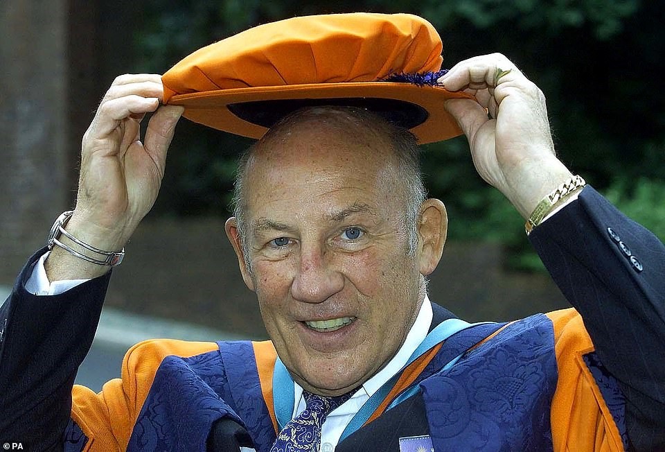 The motor racing legend poses for a picture after receiving an honorary doctorate in technology from Sunderland university.