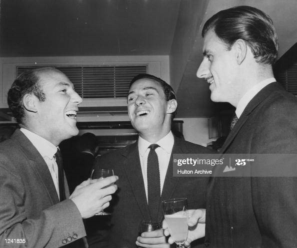 14 January 1964. Stirling Moss, Jim Clark and Graham Hill share a joke at the Savoy Hotel. 