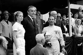 Stirling Moss on the podium at Monaco.