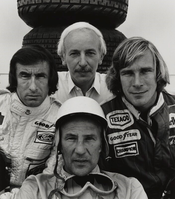 Stirling Moss with Jackie Stewart and James Hunt.