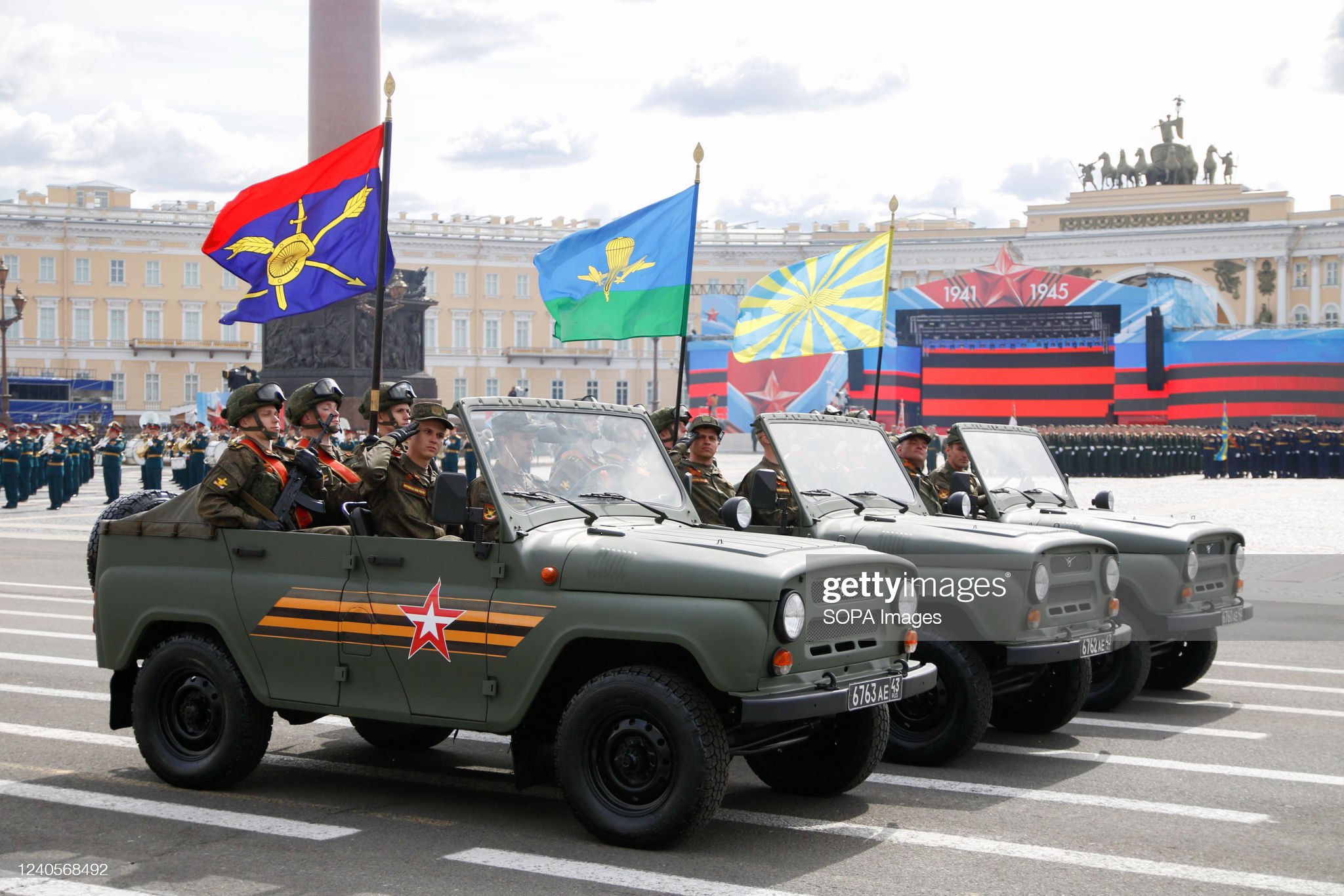 UAZ cars take part in a parade.